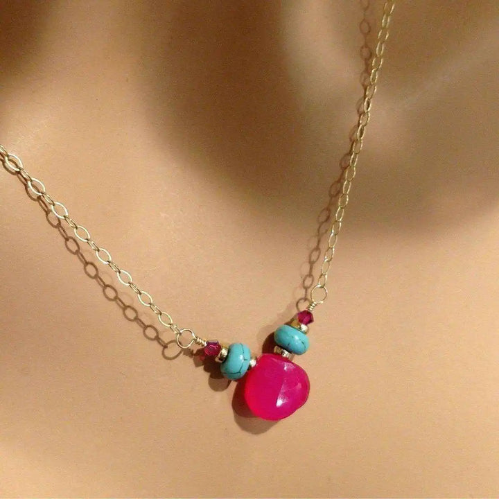 Gold Filled Turquoise and Pink Gemstone Drop Necklace featuring pink chalcedony and turquoise beads on gold chain.