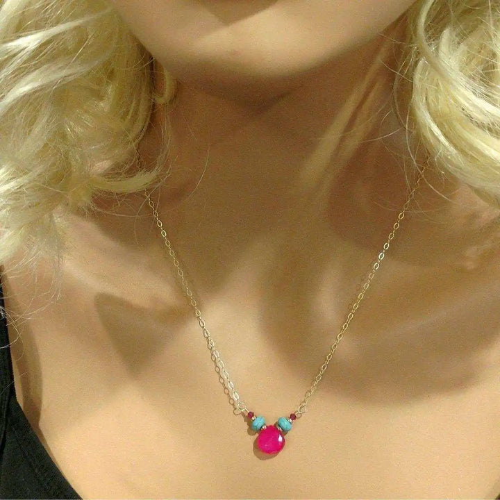 Gold Filled Turquoise and Pink Gemstone Drop Necklace displayed on a mannequin with a vibrant pink chalcedony and turquoise stones.