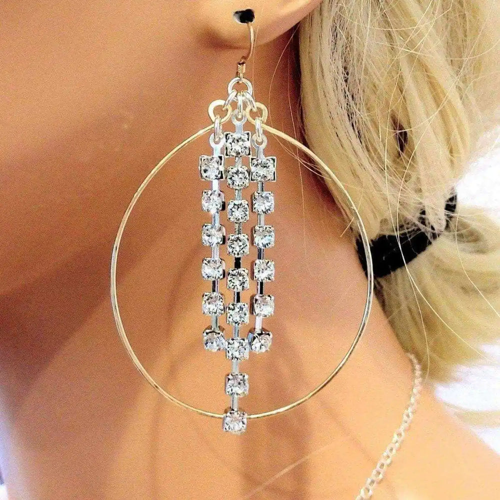 Hammered 14 K Gold Filled Oval Hoop Crystal Chain Earrings featuring sparkling crystals and elegant design.