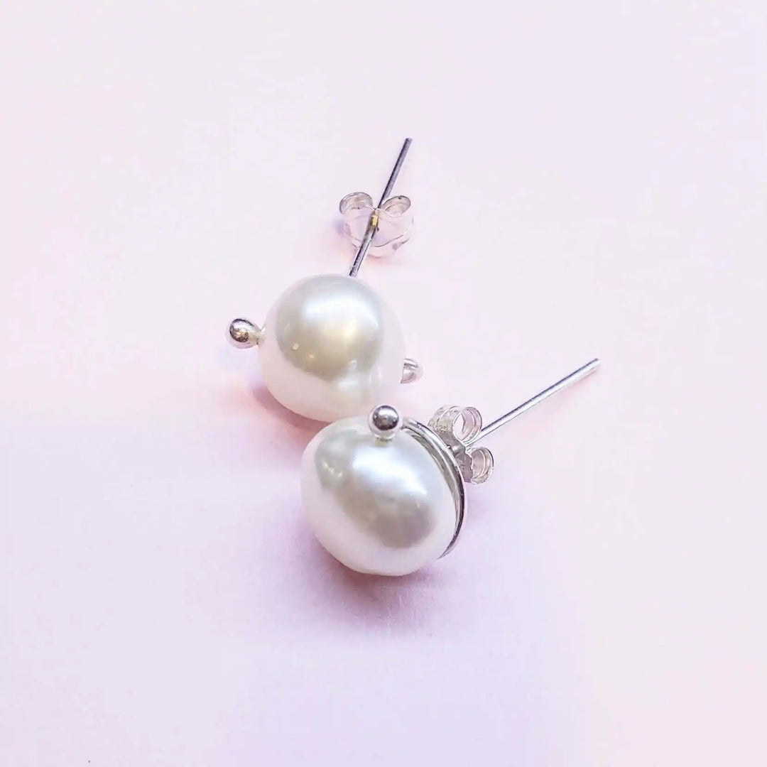 AMD1309Handmade Baroque Freshwater Pearl Silver Spiral StudsJewelryEarrings$ 35.00Alexa Martha Designs