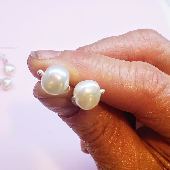 AMD1309Handmade Baroque Freshwater Pearl Silver Spiral StudsJewelryEarrings$ 35.00Alexa Martha Designs