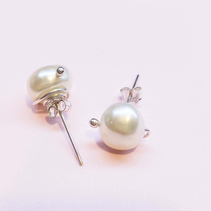 AMD1309Handmade Baroque Freshwater Pearl Silver Spiral StudsJewelryEarrings$ 35.00Alexa Martha Designs