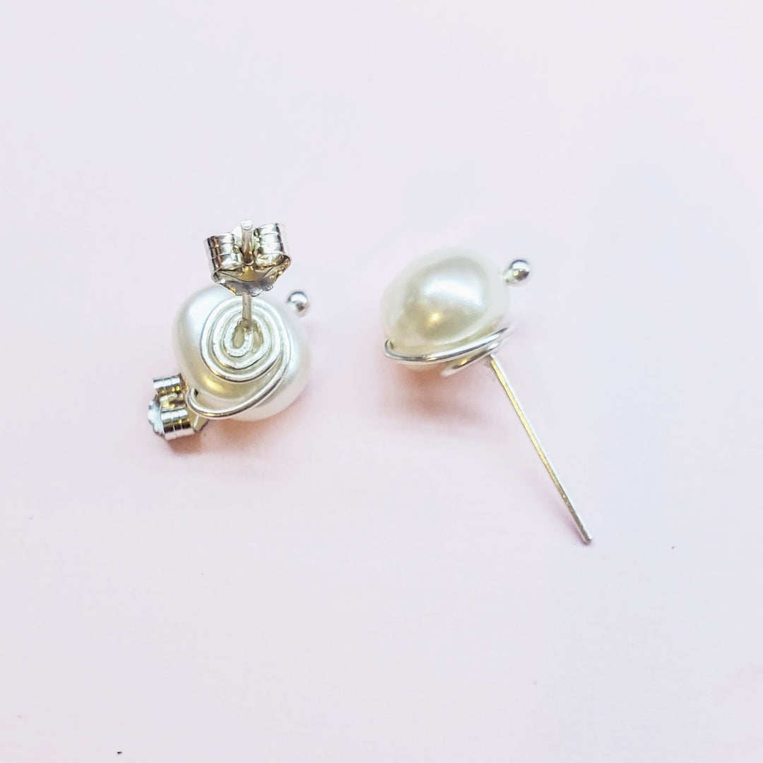 AMD1309Handmade Baroque Freshwater Pearl Silver Spiral StudsJewelryEarrings$ 35.00Alexa Martha Designs