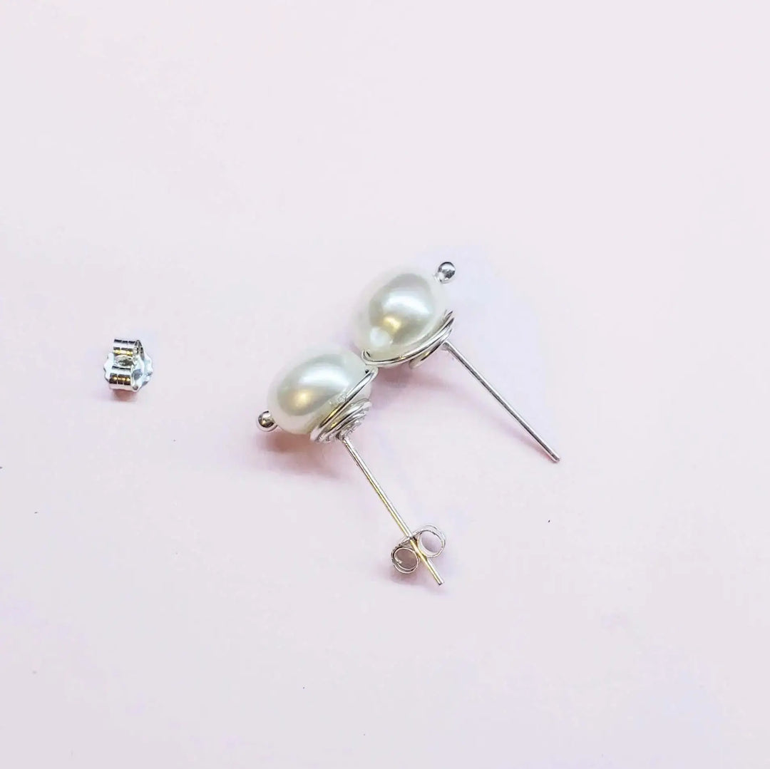 AMD1309Handmade Baroque Freshwater Pearl Silver Spiral StudsJewelryEarrings$ 35.00Alexa Martha Designs