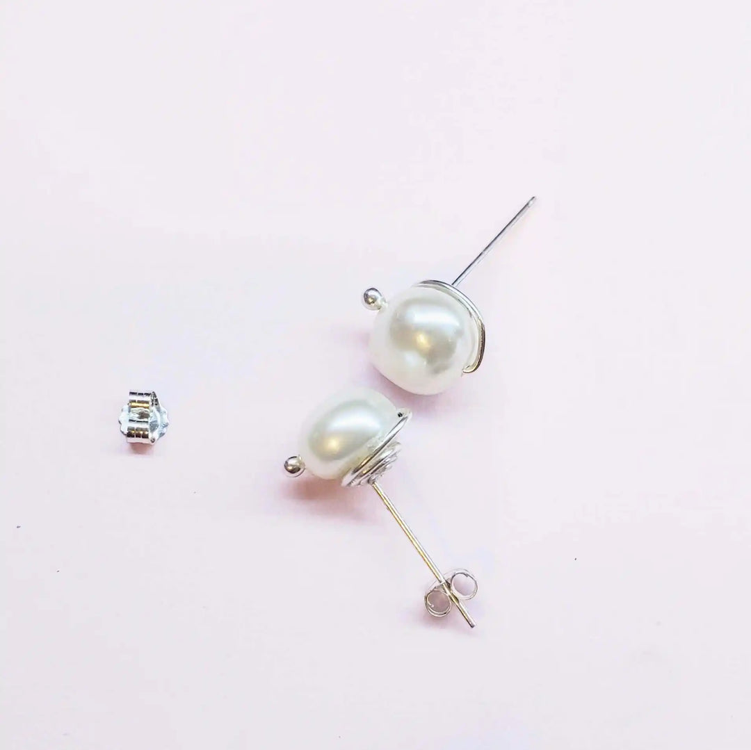 AMD1309Handmade Baroque Freshwater Pearl Silver Spiral StudsJewelryEarrings$ 35.00Alexa Martha Designs