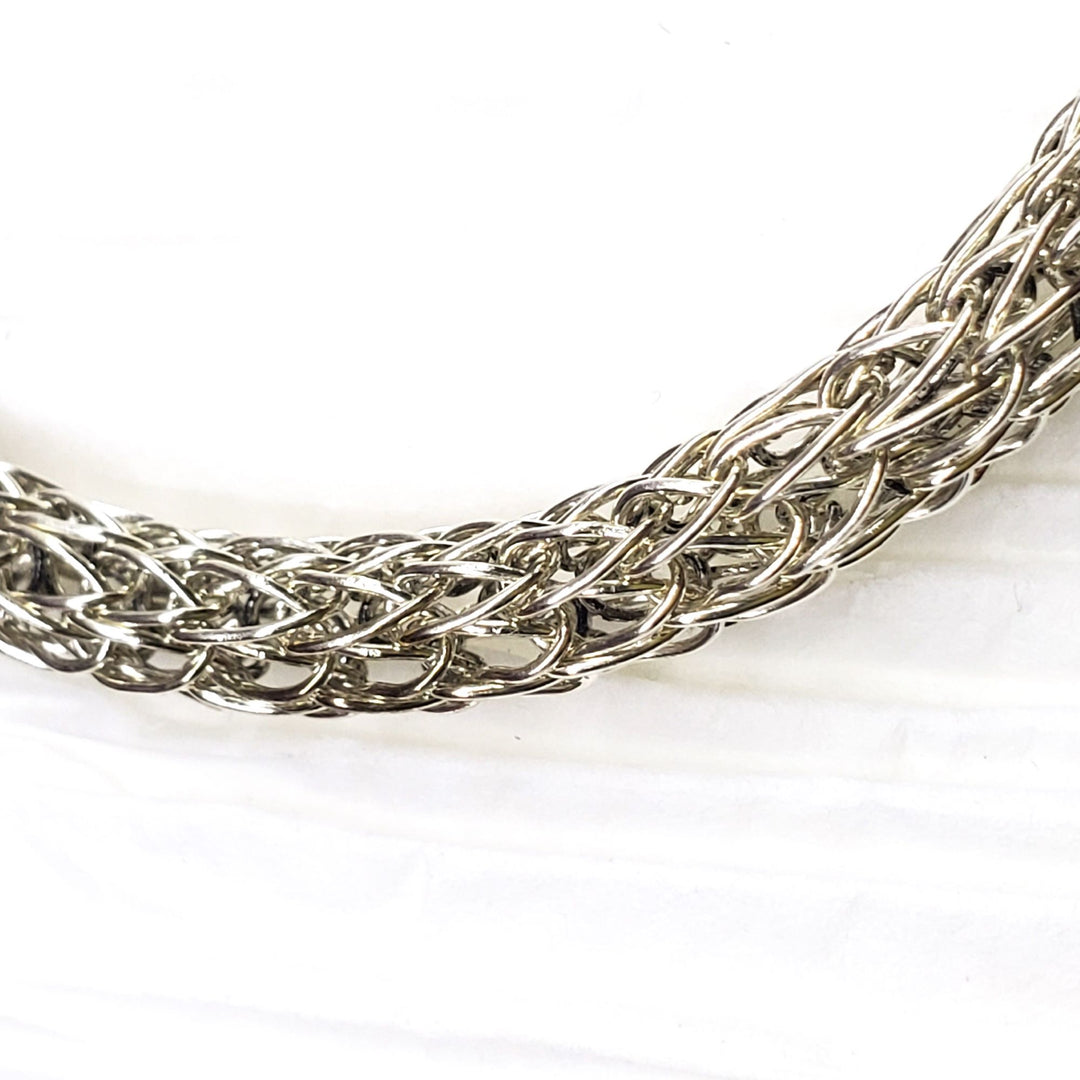 AMD1266Handmade 10mm Silver Viking Knit Bracelet with Ruby CharmJewelryBracelet$ 190.00Alexa Martha Designs