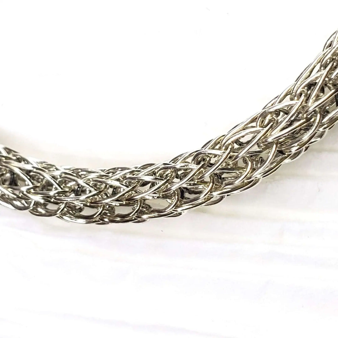 AMD1266Handmade 10mm Silver Viking Knit Bracelet with Ruby CharmJewelryBracelet$ 190.00Alexa Martha Designs