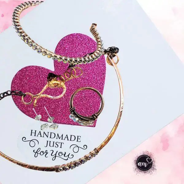 Handmade 7-year anniversary Copper Crystal Choker Set displayed with a pink glitter heart background.