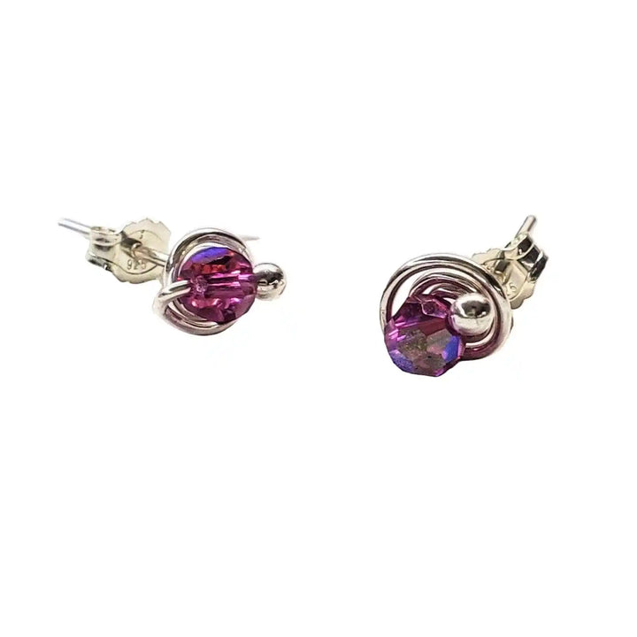4mm handmade silver crystal spiral ear studs with purple Swarovski crystals in a spiral design