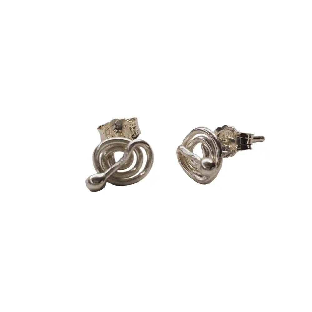 4mm handmade silver crystal spiral ear studs showcasing elegant spiral design with Swarovski crystals.