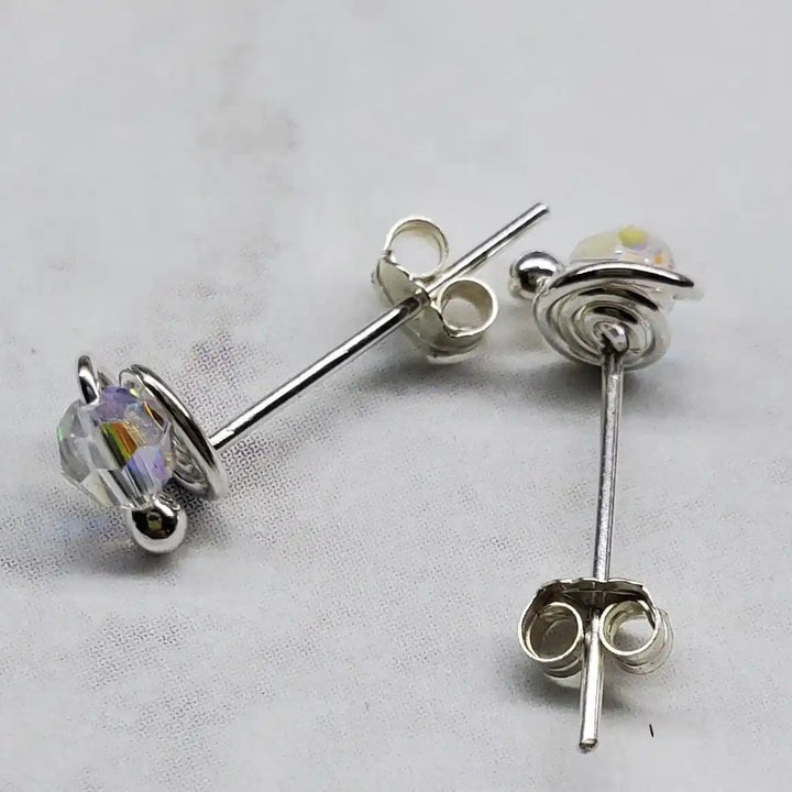4mm handmade silver crystal spiral ear studs with sparkling Swarovski crystals in unique spiral design.