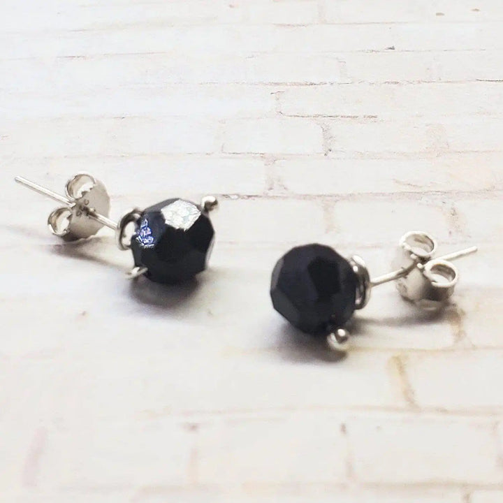 4mm handmade silver crystal spiral ear studs featuring black crystals and sterling silver design.