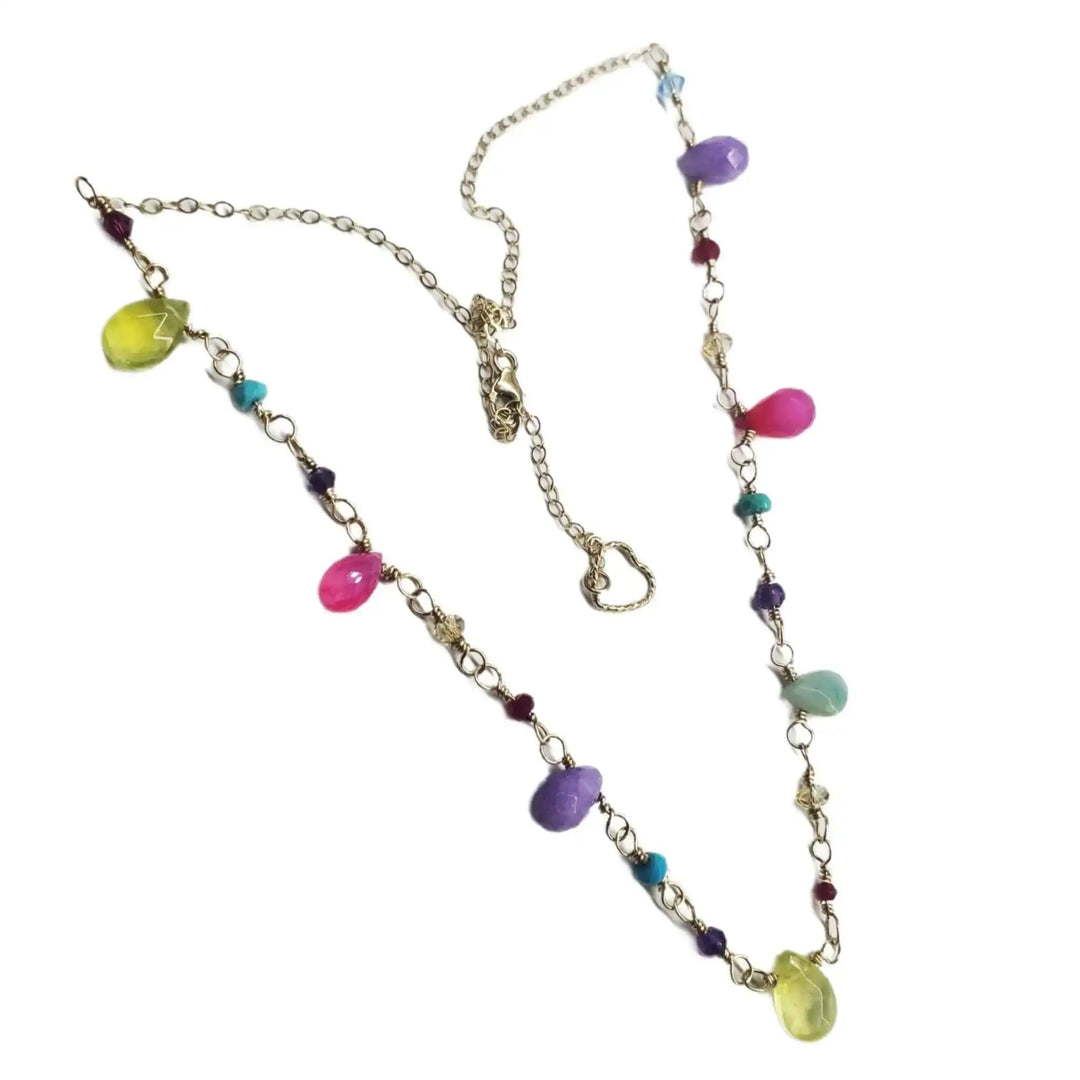 Adjustable Golden Wire Wrapped Kunterbunt Gemstone Necklace featuring colorful gemstones on a delicate golden chain.