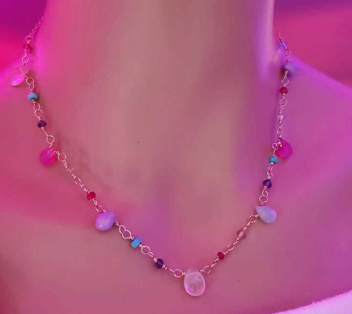 Adjustable Golden Wire Wrapped Kunterbunt Gemstone Necklace showcased on a mannequin, featuring colorful gemstones.