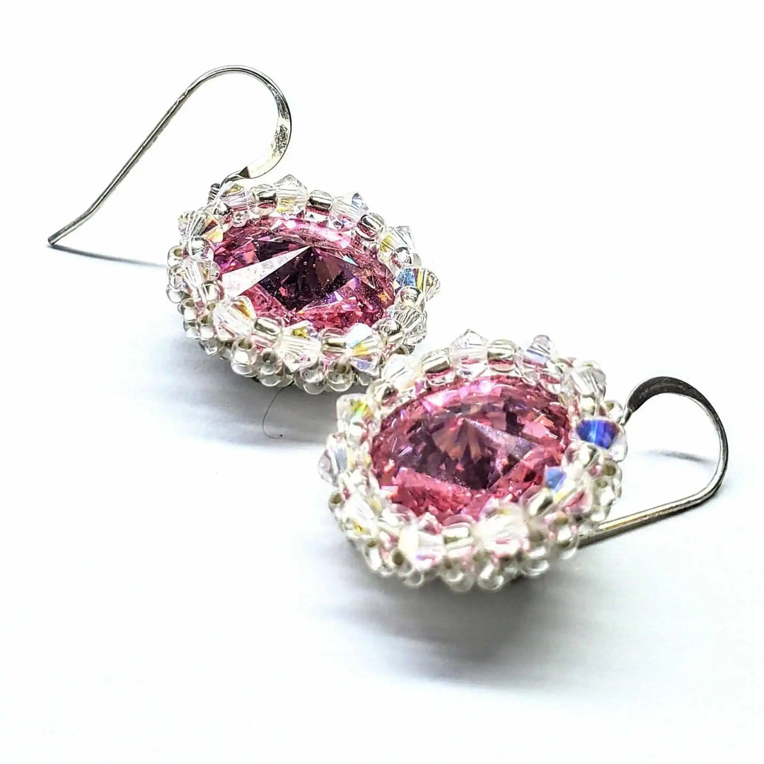 Handmade Beaded Bezel Pink Crystal Halo Earrings featuring rose pink Swarovski Rivoli crystal with beaded halo design.