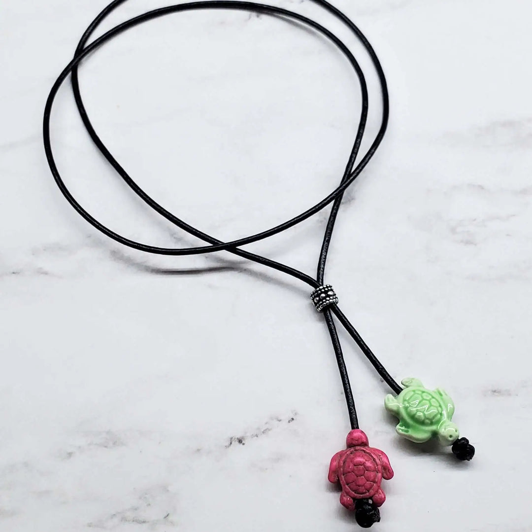 AMD1318-2Handmade Black Leather Colored Ceramic Talking NecklaceJewelryNecklace$ 25.00Alexa Martha Designs