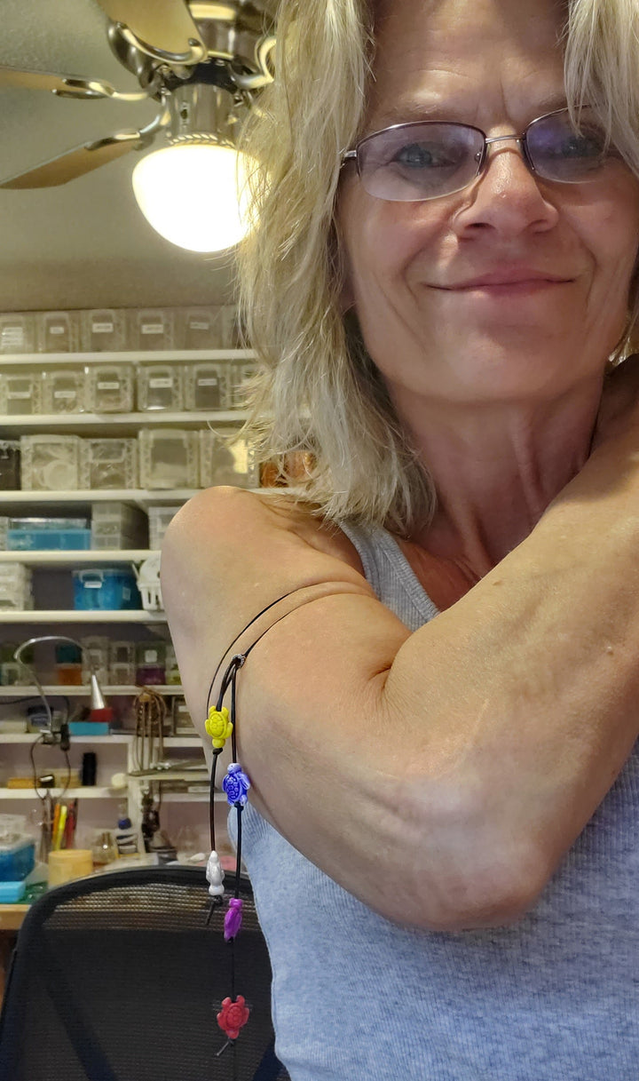 AMD1318-2Handmade Black Leather Colored Ceramic Talking NecklaceJewelryNecklace$ 25.00Alexa Martha Designs