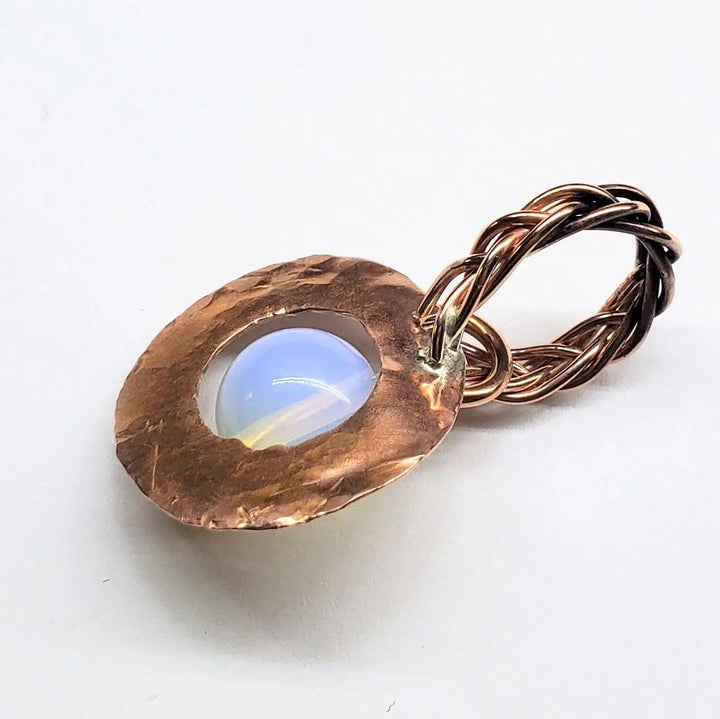Handmade copper wire braided bail gemstone necklace featuring rare Luminite gemstone.