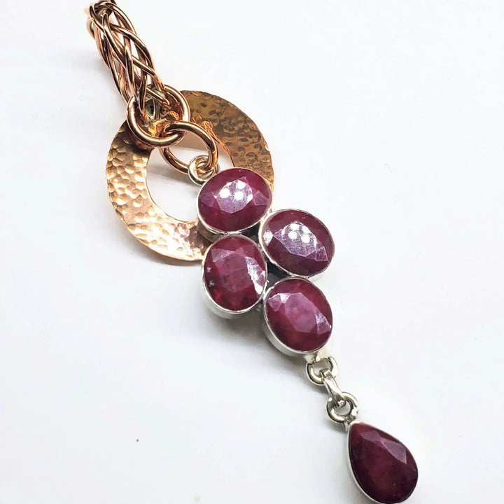 AMD1335Handmade Copper 5 Wire Braided Hammered Ruby Donut PendantCharms &amp; PendantsNecklace$ 91.00Alexa Martha Designs
