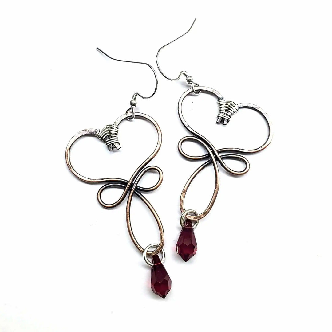 Handmade Copper Wire Sculpted Heart Crystal Drop Earrings featuring sparkling red crystals and elegant wire design.