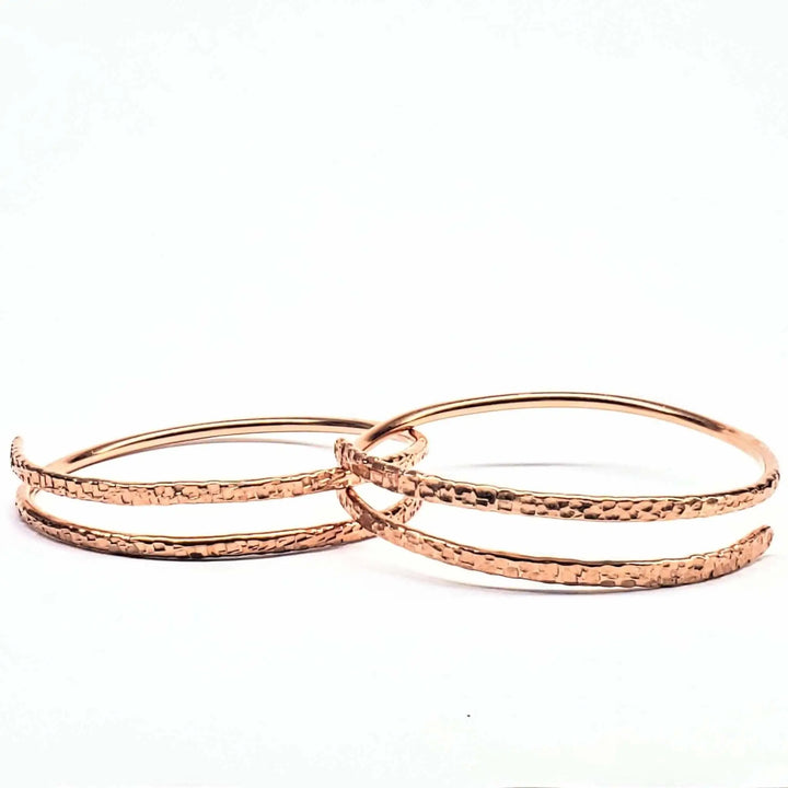 Copper Full Overlap Inter Locking Bangle Set featuring a unique design that creates an optical illusion.