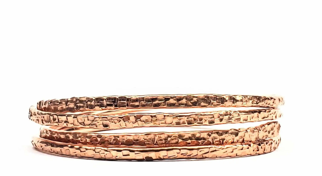 Copper Full Overlap Inter Locking Bangle Set showcasing the unique hammered texture and design.