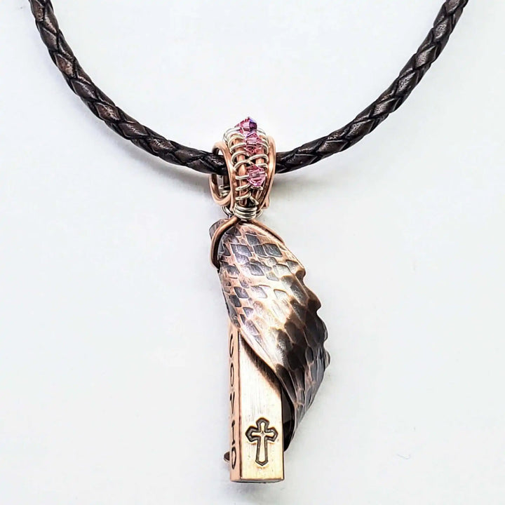 Sculpted Copper Angelwing Crystal Birthstone Necklace featuring a copper angel wing pendant with Swarovski crystal.