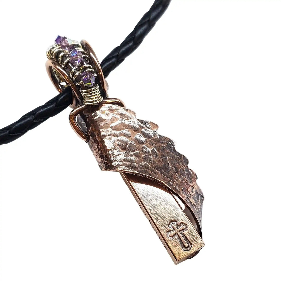Sculpted Copper Angelwing Crystal Birthstone Necklace with a hammered copper angel wing pendant and amethyst crystals.