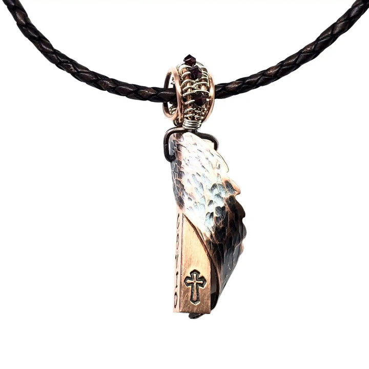 Sculpted Copper Angelwing Crystal Birthstone Necklace featuring a detailed copper angel wing pendant.