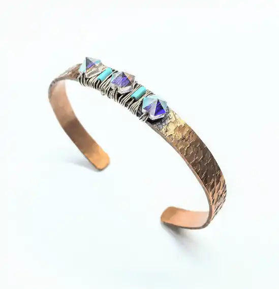 Handmade Copper Turquoise Crystal Spike Cuff featuring turquoise tube and crystal spikes on a hammered cuff.