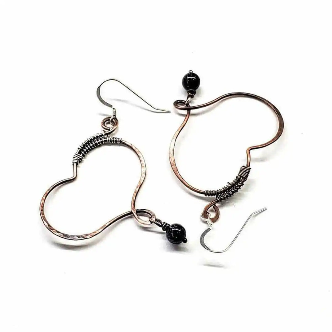 Sculpted Copper Butterfly Wing Abuse Survivor Earrings featuring black Swarovski crystals and sterling silver ear wires.