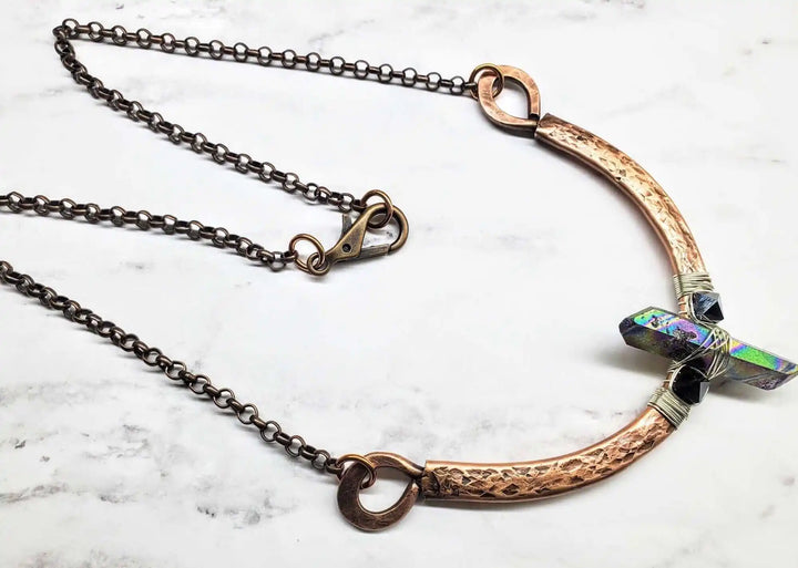 Hammered Sculpted Wire Wrapped Fight For The Truth Necklace featuring raw titanium and Swarovski spike crystals.