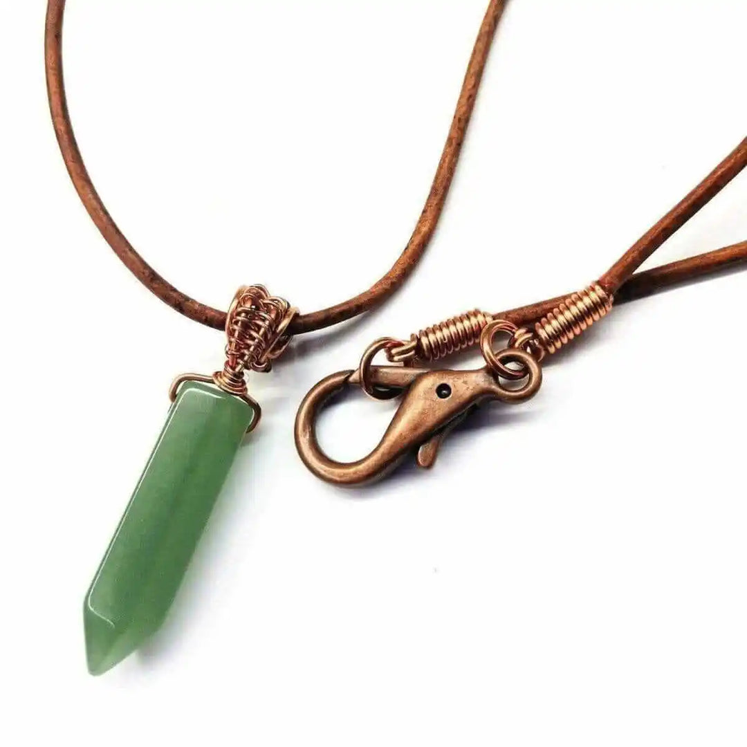 Handmade Rustic Wire Wrapped Gemstone Leather Necklace featuring a green pointed crystal on leather cord.
