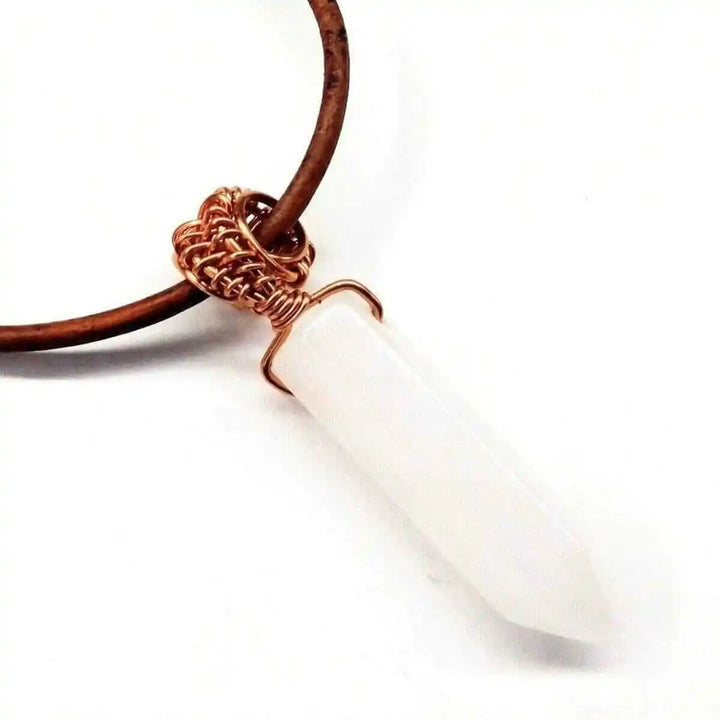 Handmade Rustic Wire Wrapped Gemstone Leather Necklace with a white pointed crystal pendant on brown leather cord.