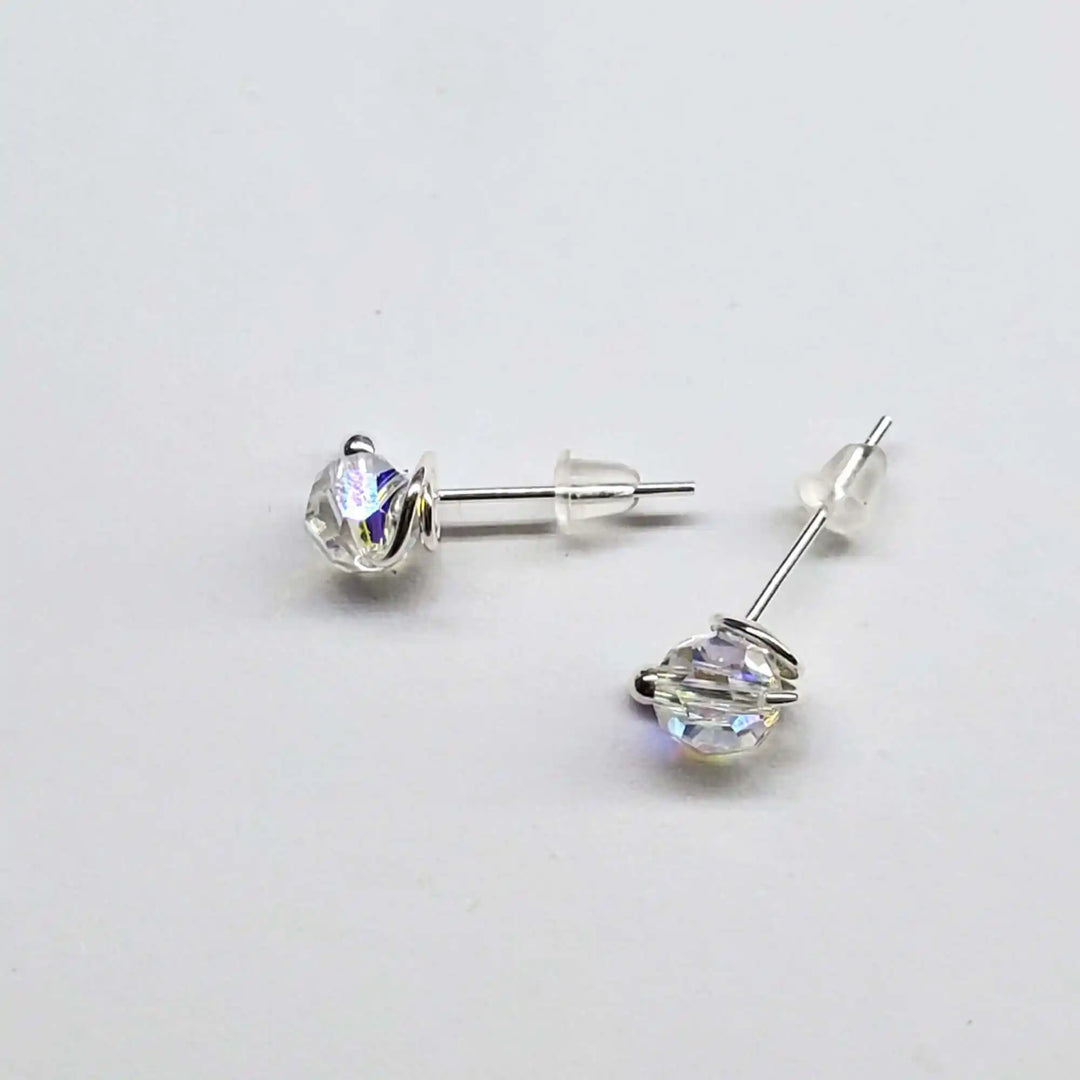Handmade 6mm Silver Spiral Crystal Stud Earrings featuring sparkling Swarovski crystals.