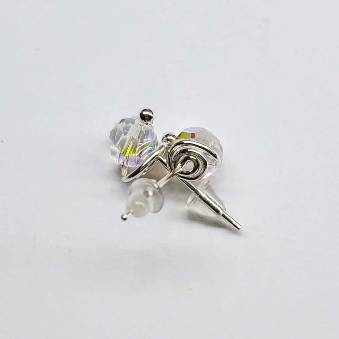 Handmade 6mm Silver Spiral Crystal Stud Earrings showcasing sparkling Swarovski crystals and sterling silver details.