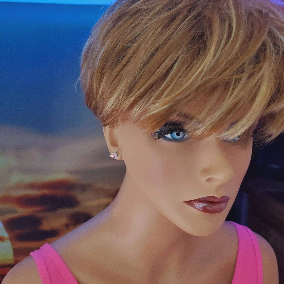 Handmade 6mm Silver Spiral Crystal Stud Earrings showcased on a mannequin with short blonde hair and blue eyes.