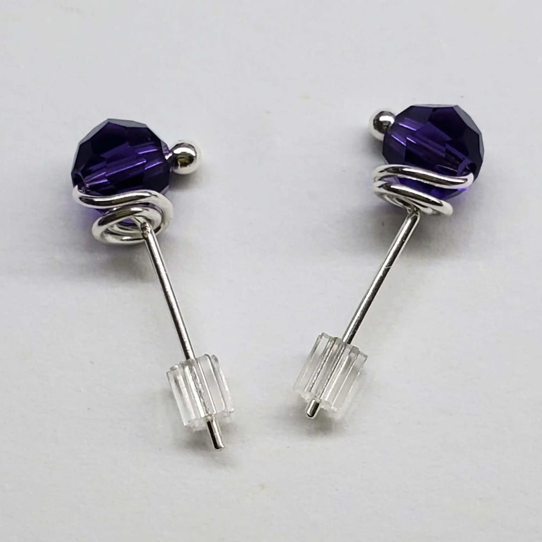 Handmade 6mm Silver Spiral Crystal Stud Earrings with purple Swarovski crystals and sterling silver spirals.