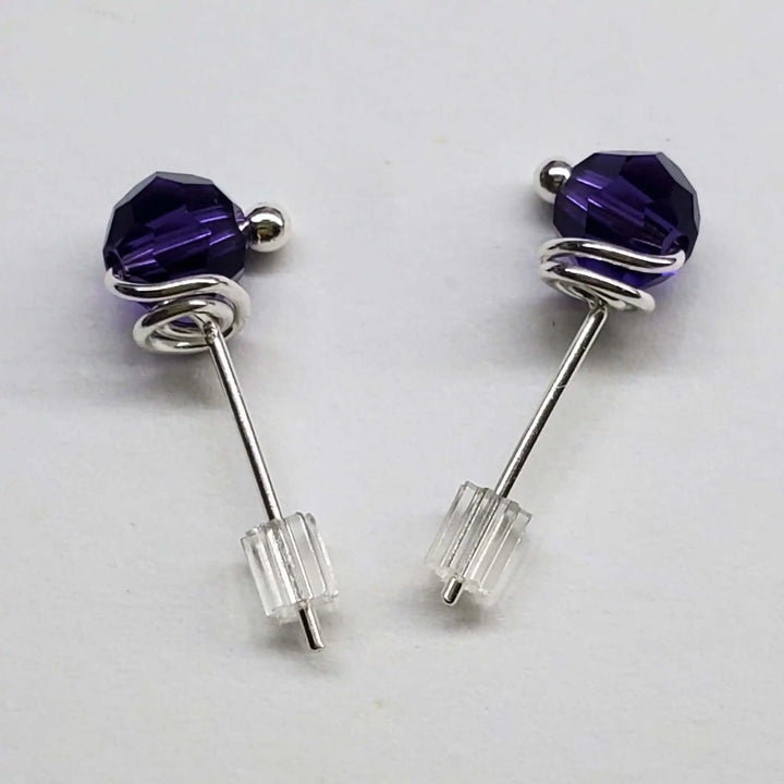 Handmade 6mm Silver Spiral Crystal Stud Earrings with purple Swarovski crystals and sterling silver spirals.