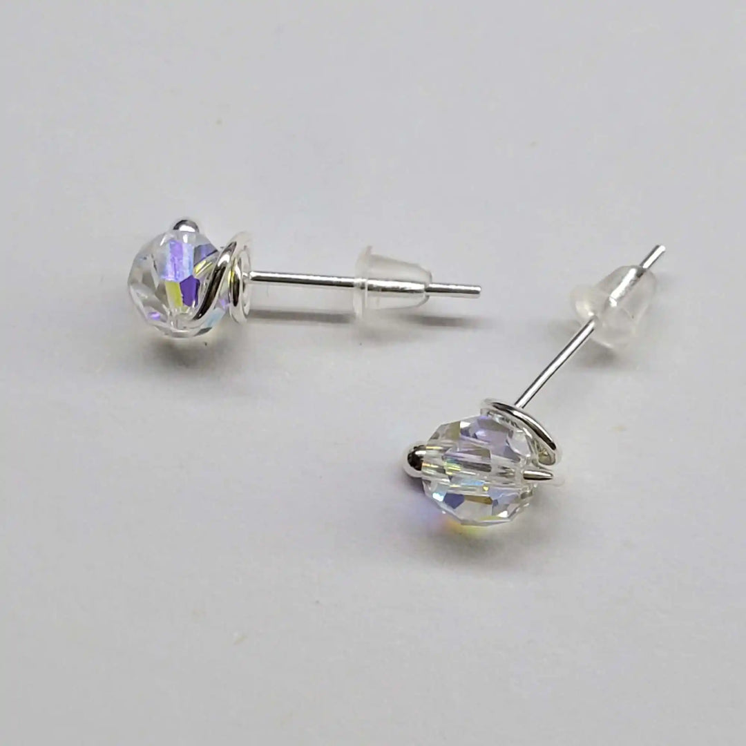 Handmade 6mm Silver Spiral Crystal Stud Earrings featuring sparkling Swarovski crystals in sterling silver settings.