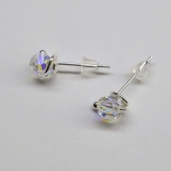Handmade 6mm Silver Spiral Crystal Stud Earrings featuring sparkling Swarovski crystals in sterling silver settings.