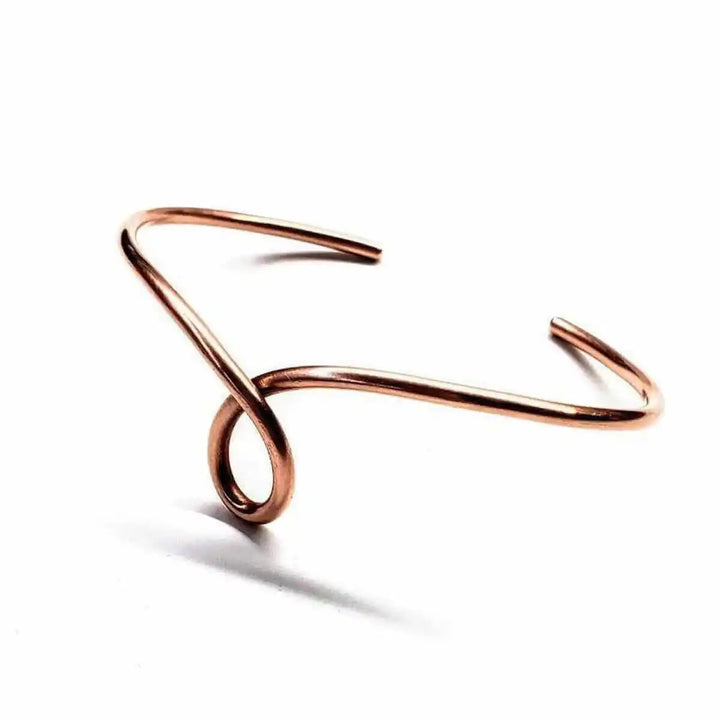Handmade Sculpted Copper Teardrop Bangle showcasing a unique teardrop design crafted from sturdy 10-gauge copper wire.