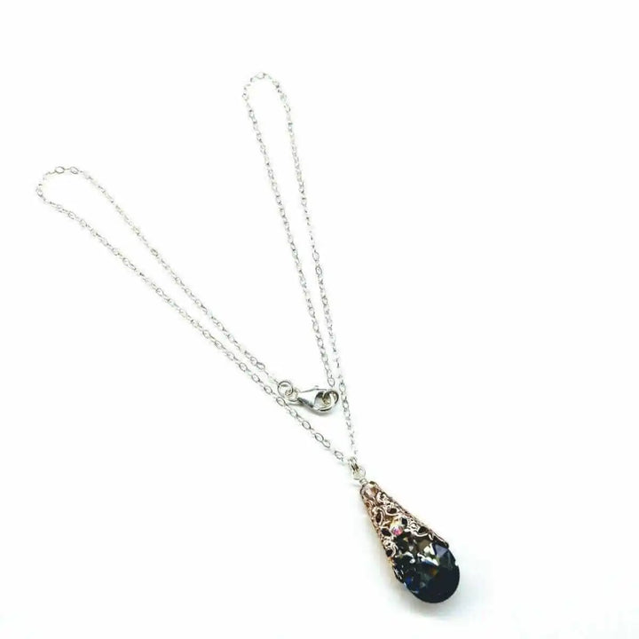 Handmade Sculpted Wrapped Rose Gold Filigree Crystal Necklace featuring a black diamond Swarovski crystal.