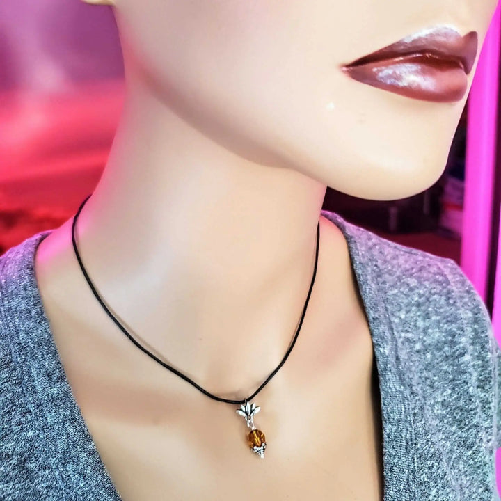 Handmade Silver Crystal Pineapple Leather Necklace displayed on a mannequin&