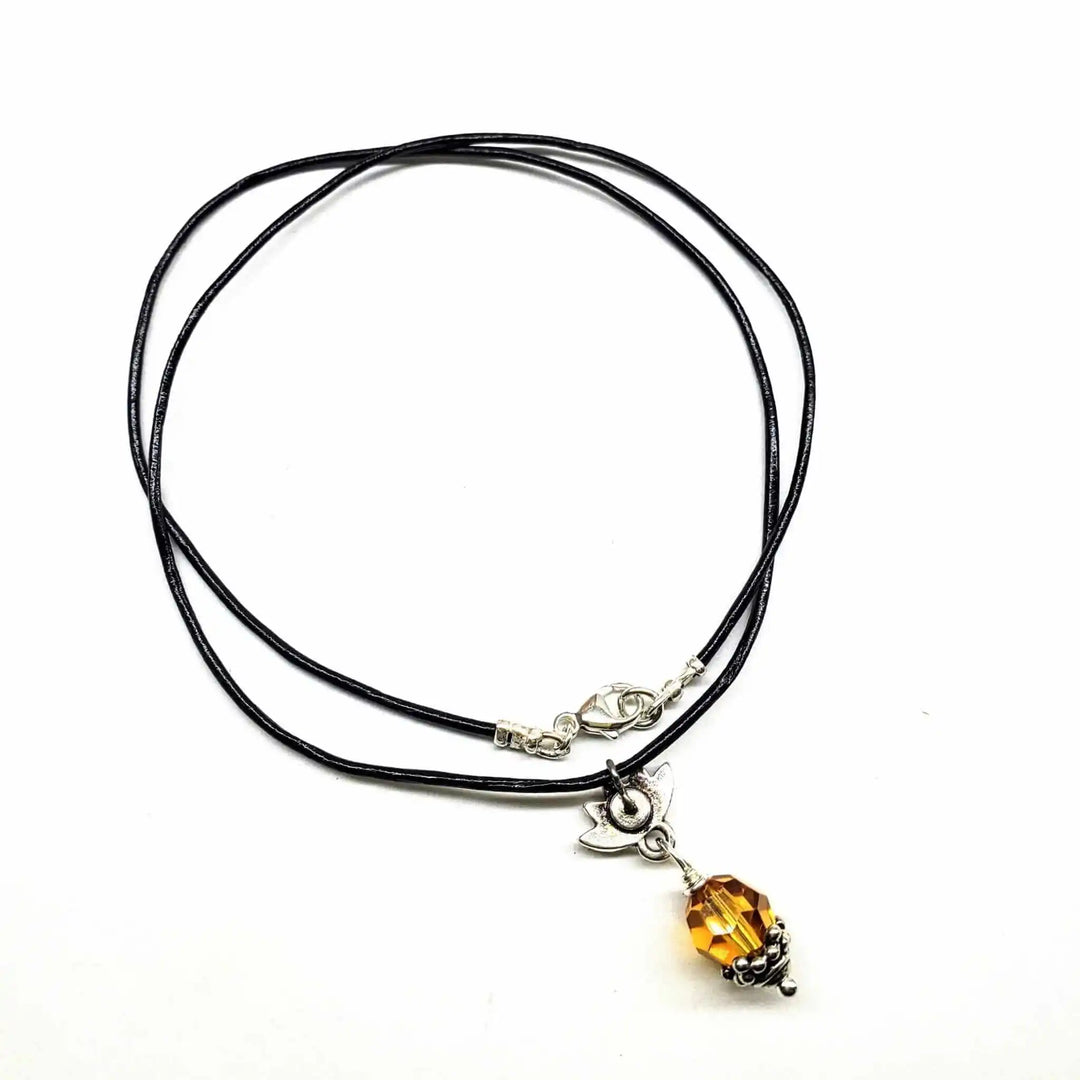 Handmade silver crystal pineapple leather necklace with a bright yellow Austrian Swarovski pendant.