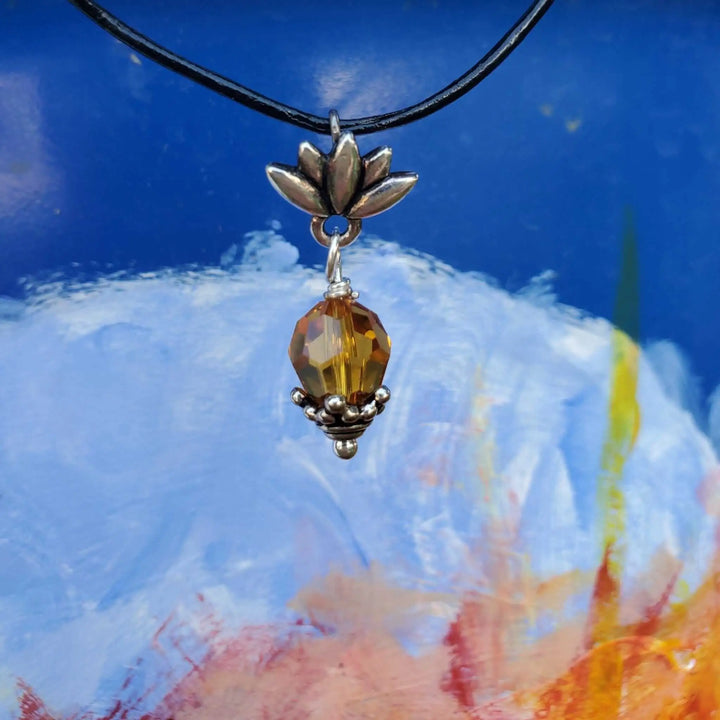 Handmade silver crystal pineapple leather necklace with a sterling silver pineapple pendant and yellow Austrian Swarovski crystal.
