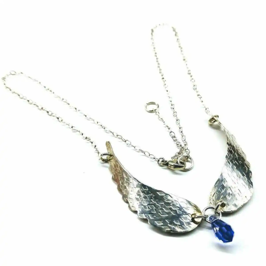 Handmade Silver Forged Sculpted Angel Wings Necklace with Swarovski crystal teardrop pendant.