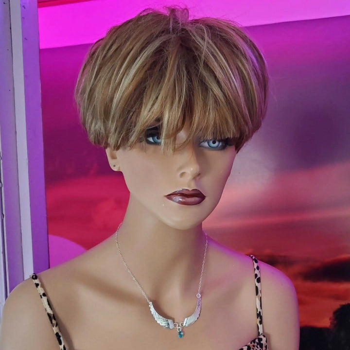 Handmade Silver Forged Sculpted Angel Wings Necklace showcased on a mannequin with a stylish hairstyle and bold makeup.