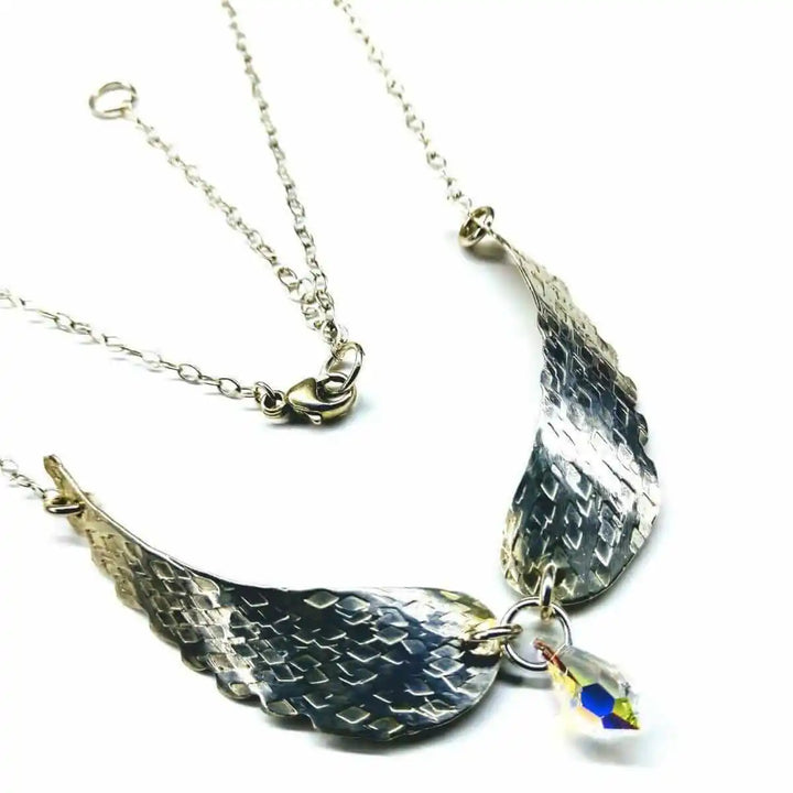 Handmade Silver Forged Sculpted Angel Wings Necklace with Swarovski crystal teardrop, original design by Alexa Martha.