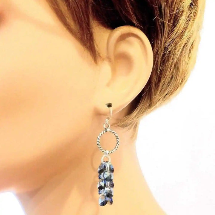 925 Silver Denim Blue Cascading Crystal Cluster Earrings showcasing a stylish design on a mannequin&